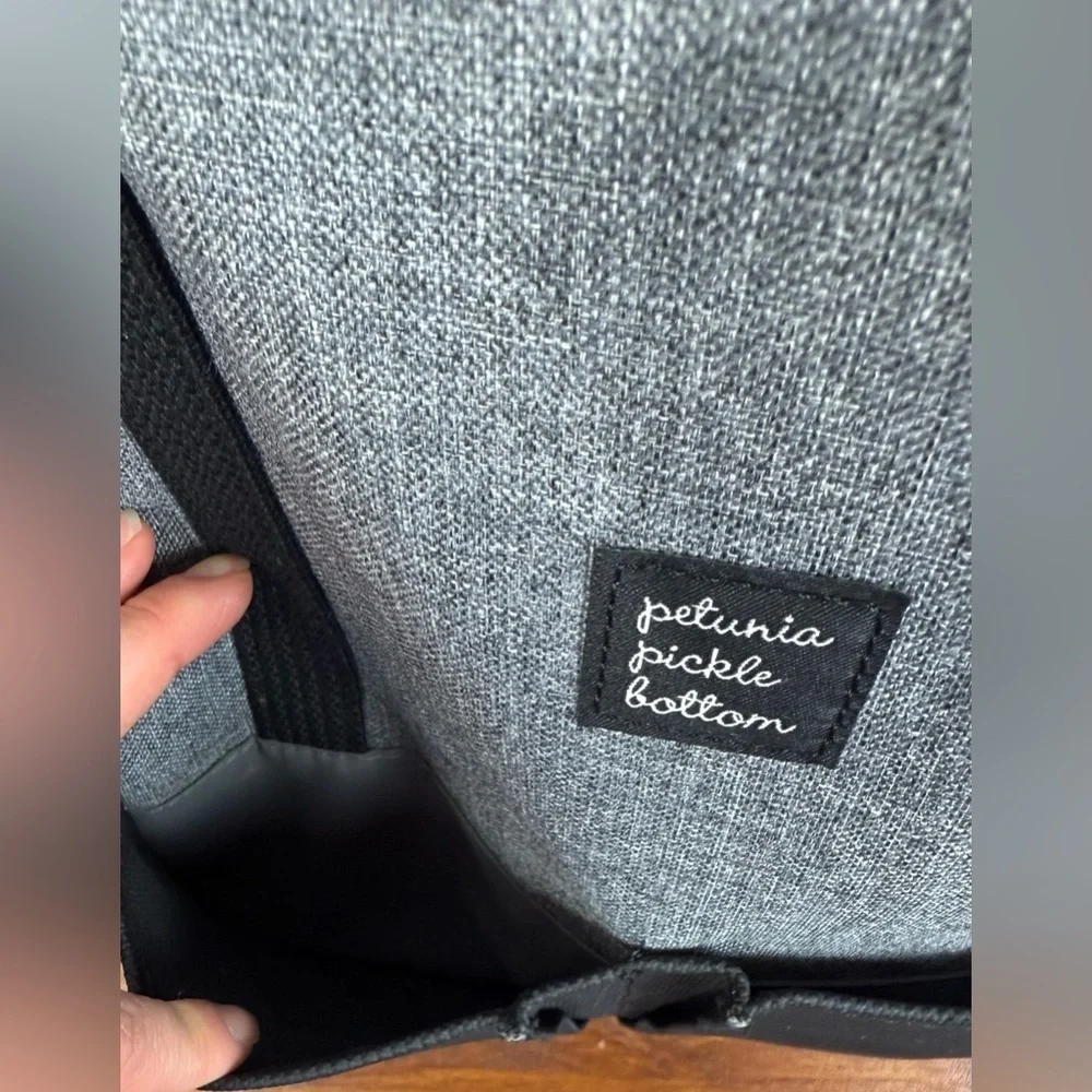 Petunia Pickle Bottom gray & black backpack shoulder diaper bag.